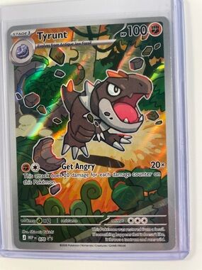 Pokemon Tyrunt Holographic Card - Brown, Green, Red